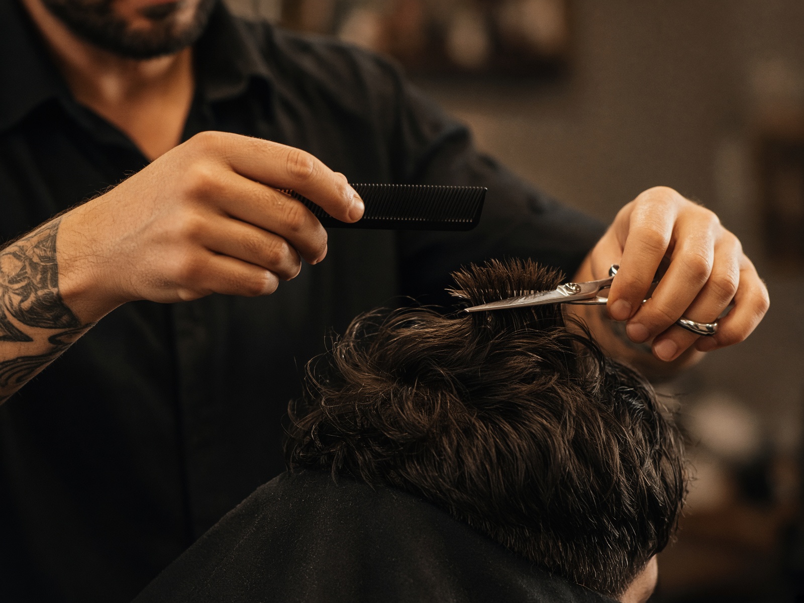 Shears cutting hair in the chair